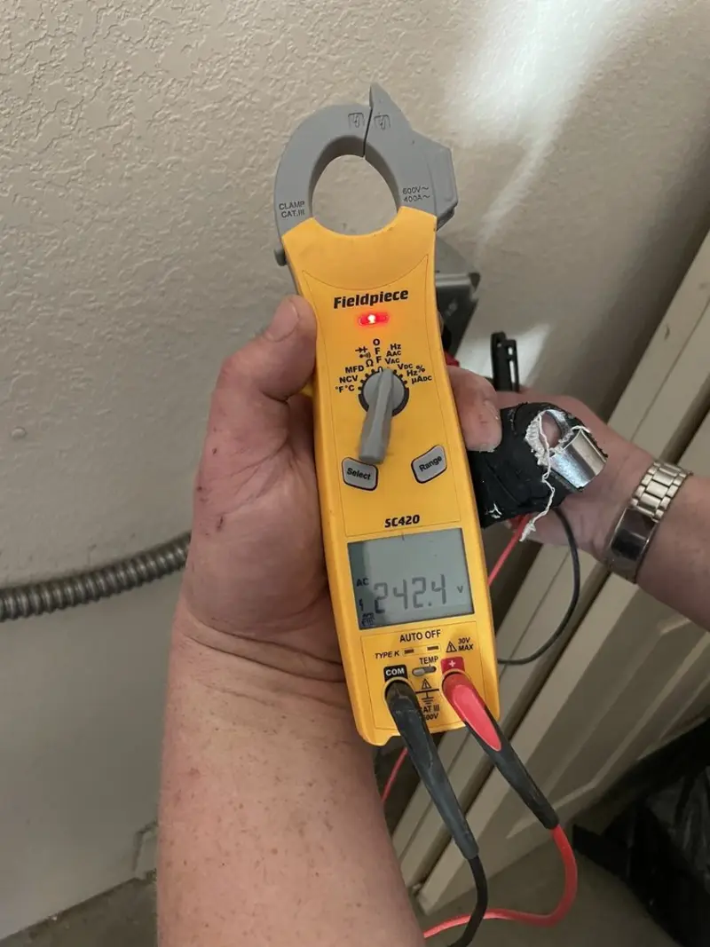 Voltage testing with clamp meter during Aluminum Wiring Replacement in Quincy
